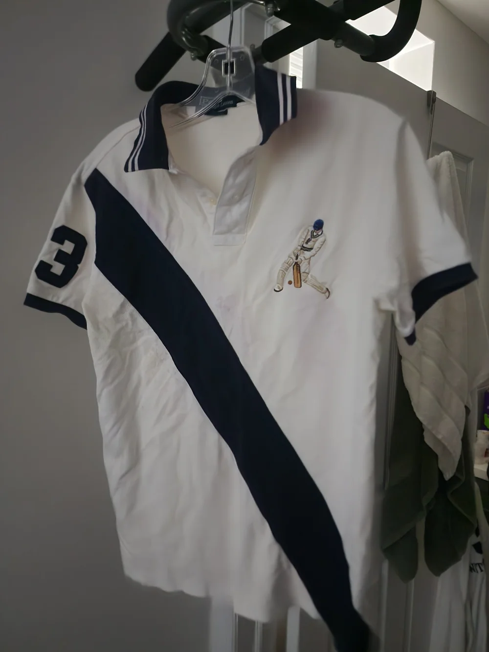 Ralph Lauren White Polo with Navy Diagonal Stripe & Cricket Player Patch. S-M